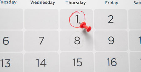Push pin on a calendar. planning. Businessの写真素材