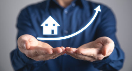 Real Estate Investment. Rising arrow with a houseの写真素材