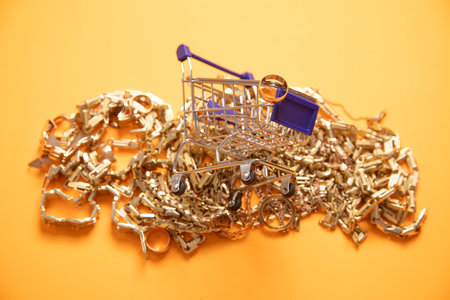Shopping card with a golden jewellery.の写真素材