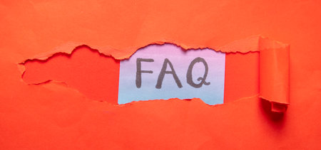 FAQ description under the torn paper.の写真素材