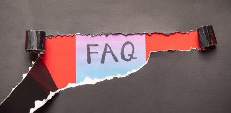 FAQ description under the torn paper.の写真素材