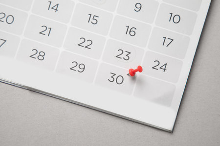 Push pin on a calendar. planning. Business