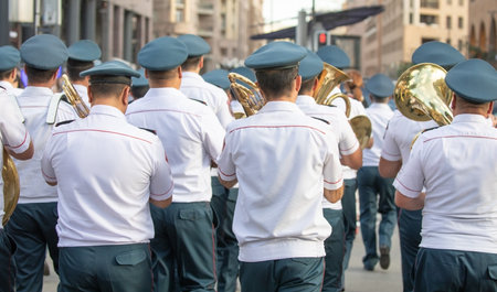 Police force officers with a musical instruments in the city.の写真素材