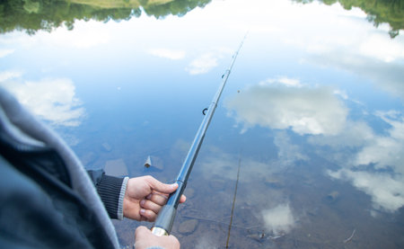 Fisherman catches fish. Fishing. Hobbyの写真素材