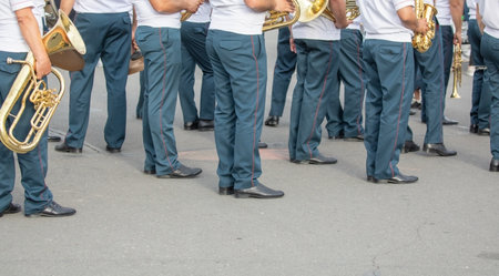 Police force officers with musical instruments in the city.の写真素材