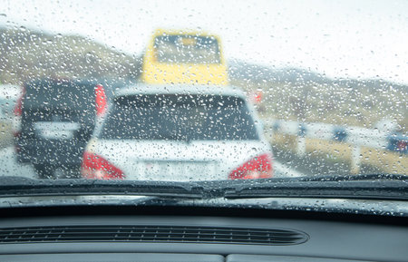 Raindrops on the glass from the car.の写真素材