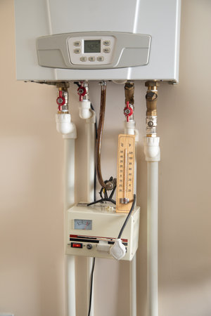 Thermometer and heating system at home.の写真素材