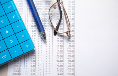 Financial accounting with a calculator and pen. Financeの写真素材