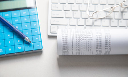 Financial accounting with a calculator and pen. Financeの写真素材