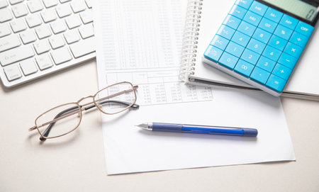 Financial accounting with a calculator and pen. Financeの写真素材