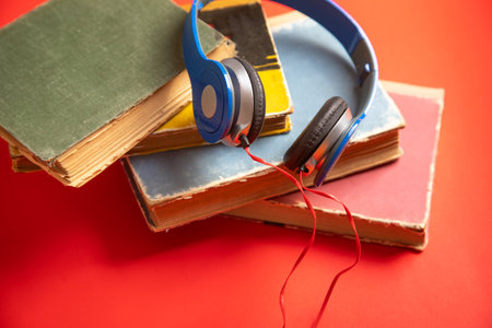 Blue headphones and book. Hobby. Musicの写真素材