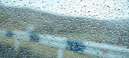 Raindrops on the glass from the car.の写真素材