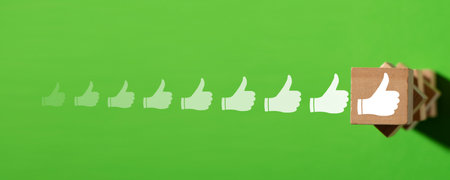 Growing thumbs up symbols. Social media. Likeの写真素材