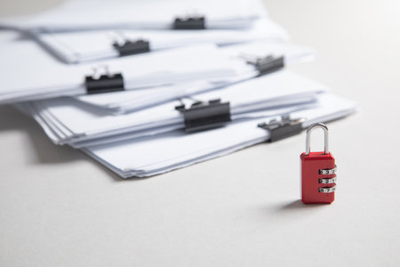 Padlock with a documents. Confidentiality. Protection of information