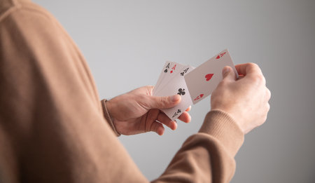 Man showing playing cards. Hobbyの写真素材