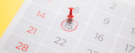 Push pin on a calendar. planning. Businessの写真素材