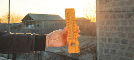 Thermometer on sky background. Sunset. Weatherの写真素材