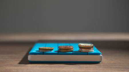 Stack of coins on the table. Finance