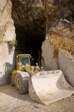Bulldozer in a marble querry entrance. (Colonata (Carrara), Italy, the famous marble quarries)の写真素材