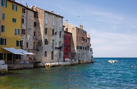 Colorful old houses and the sea in Rovinj, Croatia の写真素材