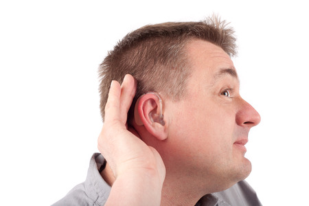 Man wearing hearing aid can't hear anything
