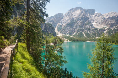 Hiking trail with beautiful panorama at Lake Braies in the Dolomites in South Tyrol, Italyの写真素材
