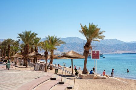 Eilat, Israel - February 11, 2016: People at the beach In Eilat, Israel