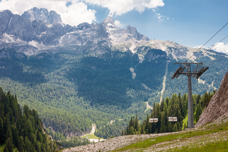Landscape from the Dolomites with cable cars in the front in Italyの写真素材