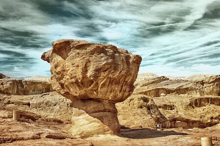 The Mushroom sandstone geological feature in Timna Park near to Eilat, Israel (HDR image with black gold filter)の写真素材