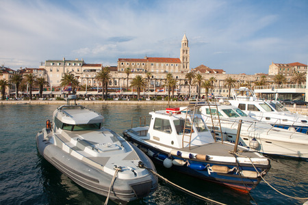 The Diocletian Palace from the harbor with ships in the front in Split City, Croatiaの写真素材