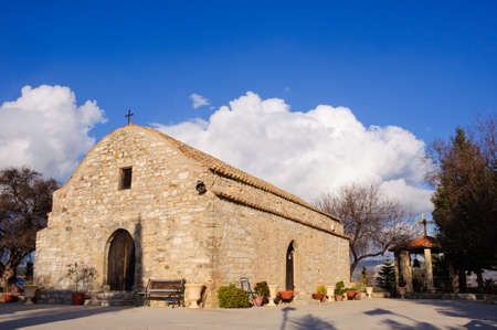 Christian church with chapel on sky cloudy backgroundの写真素材