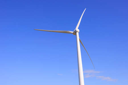 Huge windmill station with blue sky background