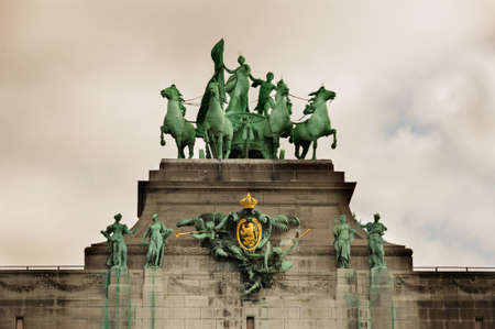 Triumphal arch (Arc de Triomphe) in Cinquantenaire park in Brussels, was planned for National Exhibition of 1880 to commemorate 50th anniversary of the independence of Belgium.の写真素材