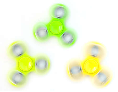 Rotating fidget spinner, a stress relief toy.の写真素材