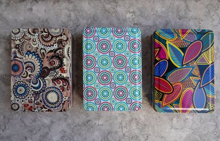 Multi-colored metal boxes. Boxes for little things. Gift boxes