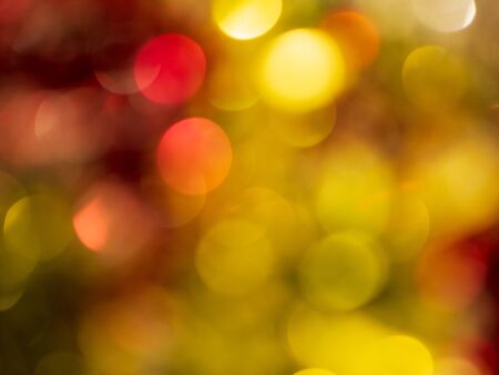 Christmas light background. Holiday glowing backdrop. Defocused Background. Blurred Bokeh.の写真素材