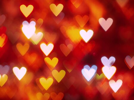 red hearts bokeh as background.の写真素材