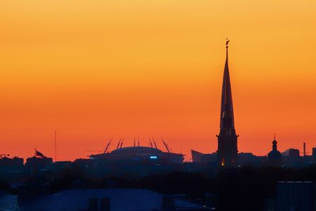 ST. PETERSBURG. RUSSIA - August 28, 2019. Krestovsky stadium, the Lakhta Center skyscraper and the Peter and Paul Fortress against a bright sunset sky.のeditorial素材