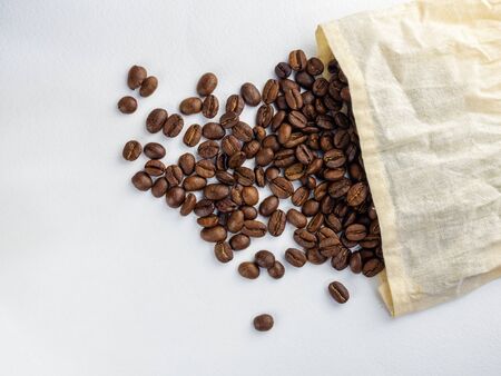 Coffee beans roasted in jute sack.の写真素材