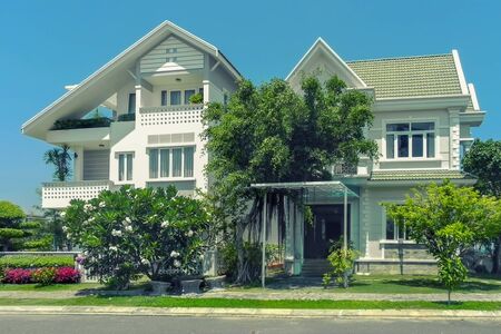 two beautiful  houses with  trees, and landscape design in the summer. An Vien. Nha trang. Vietna.の写真素材