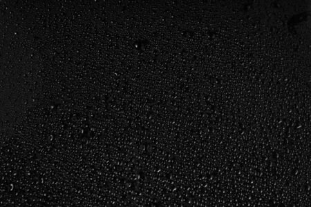 Water drops on black backgroundの写真素材
