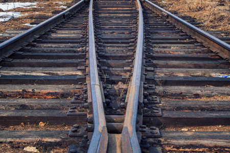 Railway in fog on station, outdoor landscape