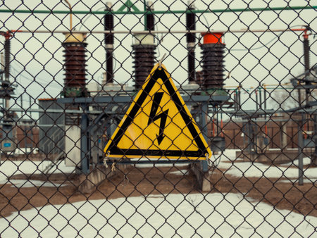 high voltage warning sign on high-voltage substationの写真素材