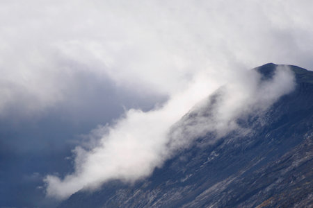 High mountains in the cloudsの写真素材