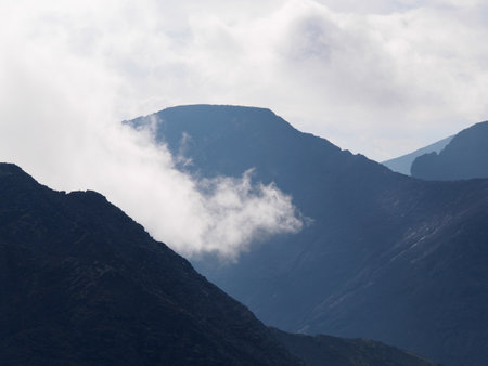 High mountains in the cloudsの写真素材