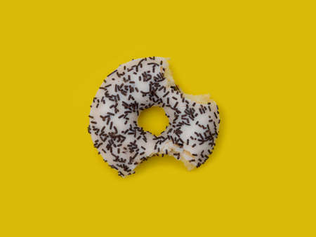 Colorful delicious donut in a row, bittenの写真素材
