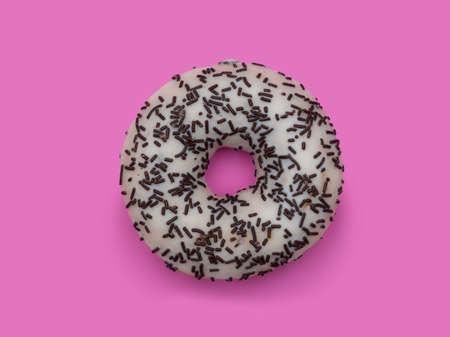 Donuts with icing on pastel pink background. Sweet donuts.の写真素材