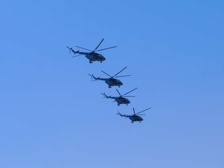 Russia, St. Petersburg - June 24, 2020: Russian military helicopters Mi-8 of the Russian Air Force in flight at the Victory Parade in World War II.のeditorial素材
