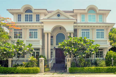 One beautiful three-story house with trees, and landscape design in the summer. An Vien. Nha trang. Vietnam.の写真素材