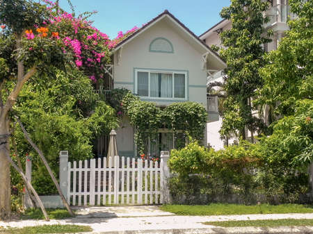 One Small cozy two-storey house with p trees, and landscape design in the summer. An Vien. Nha trang. Vietnam.の写真素材